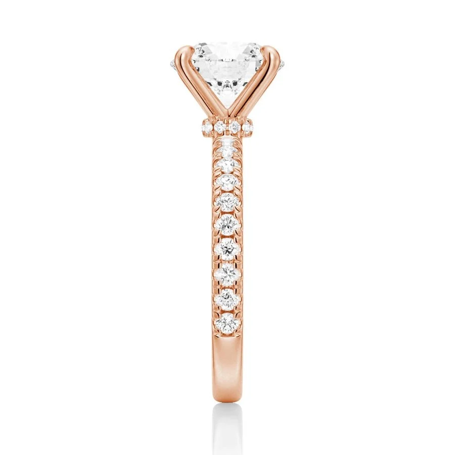 Vertical side view showing 2mm pave band on yellow gold moissanite engagement ring