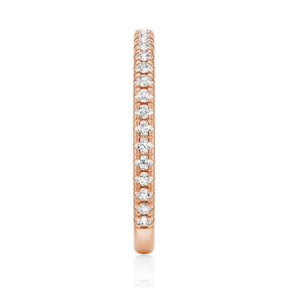 Top view showing 2mm pave set moissanite eternity band in rose gold