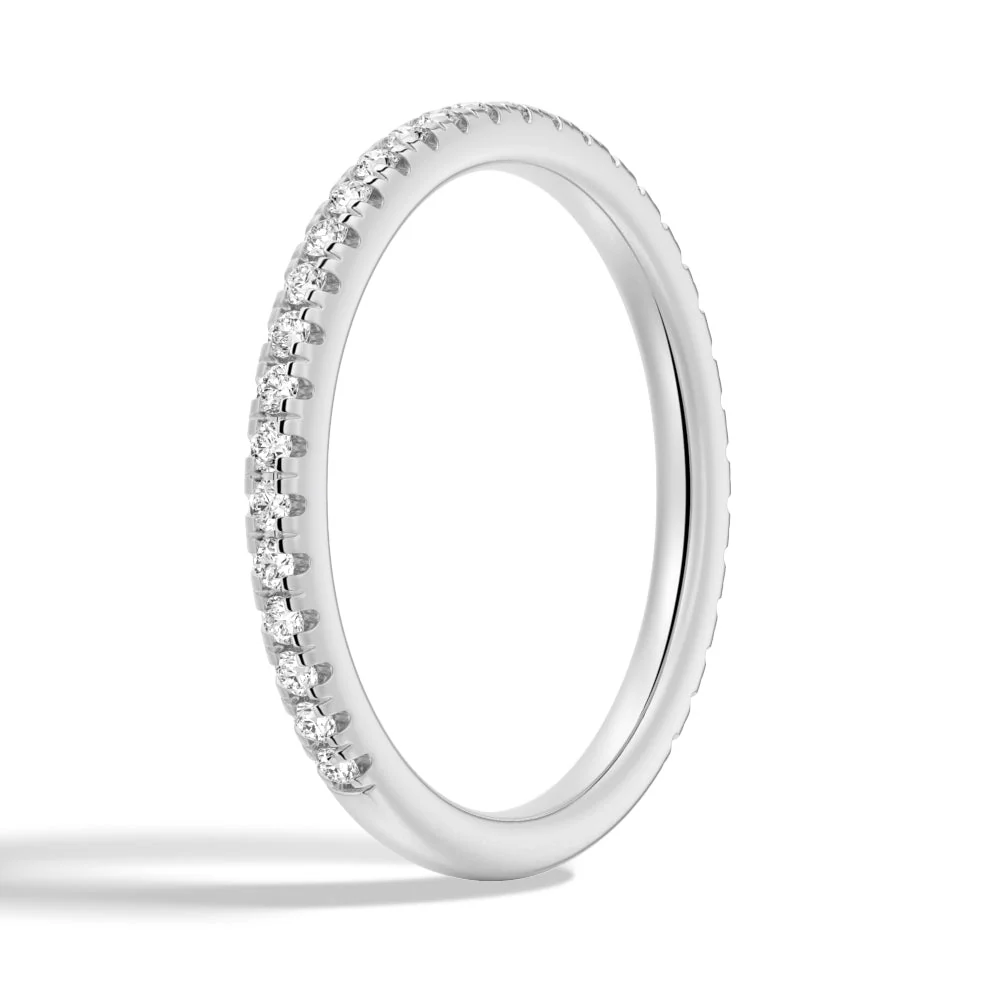 Three-quarter perspective view of 1.7mm round moissanite pave band in white gold