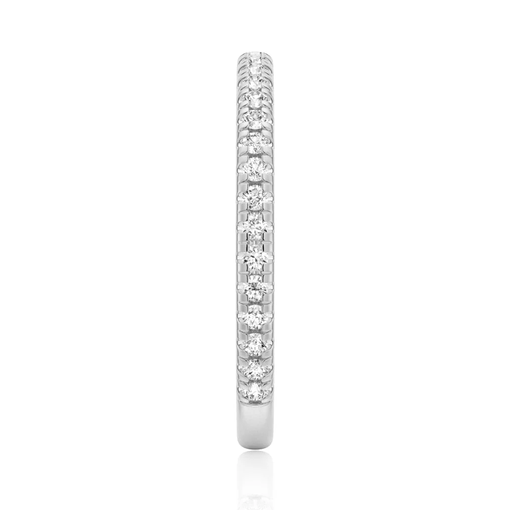 Top view showing 2mm pave set moissanite eternity band in white gold