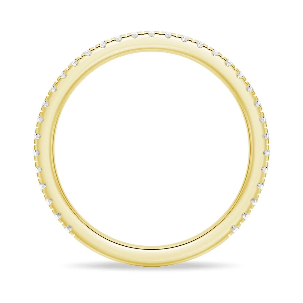 Full ring profile view of round moissanite pave wedding band in yellow gold
