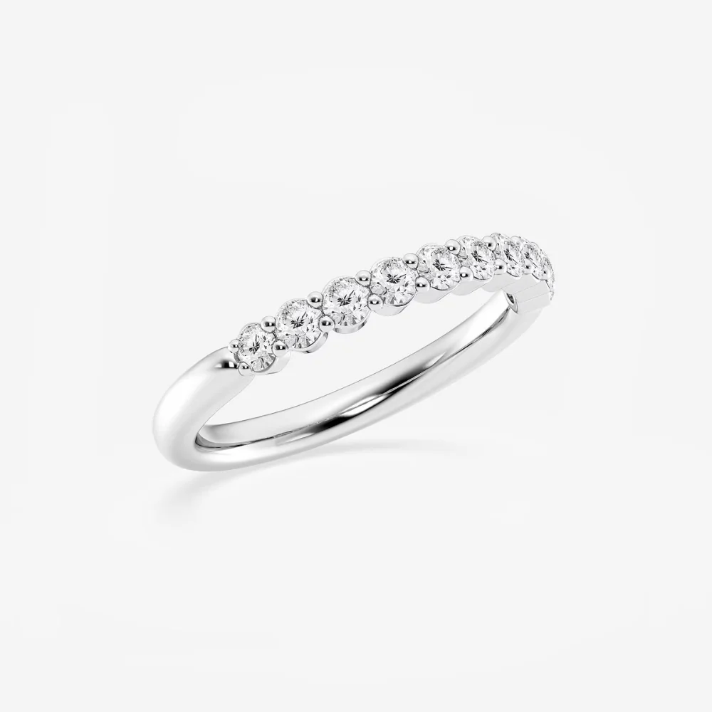 Three-quarter perspective view of round moissanite shared-prong wedding ring in white gold