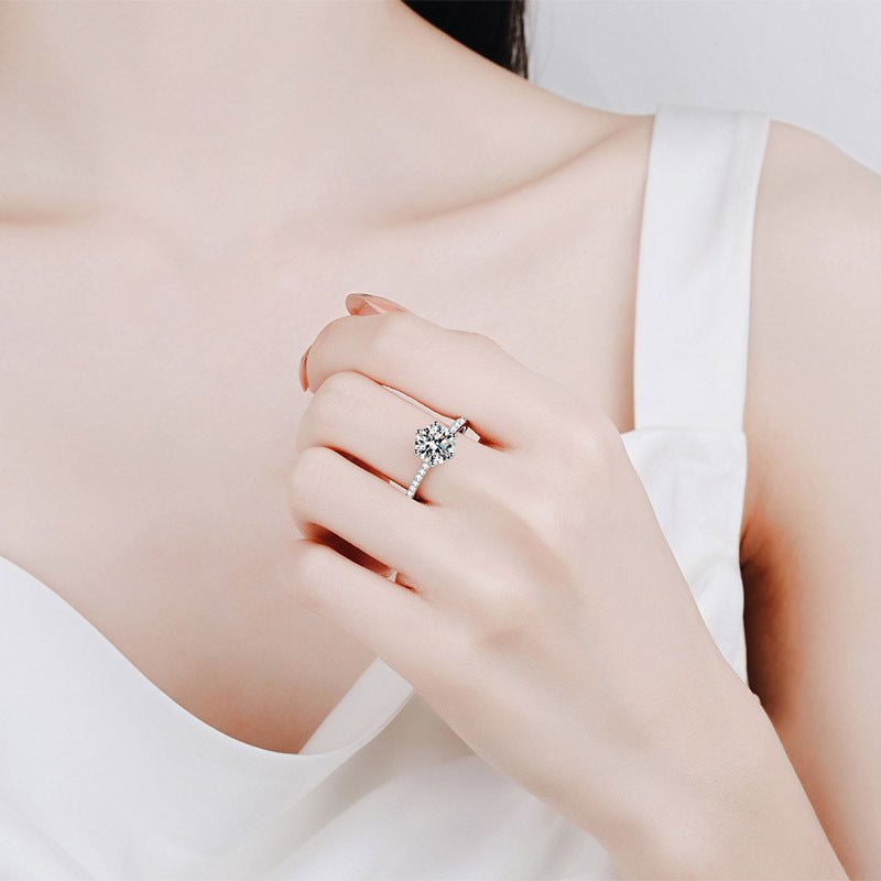 Round Moissanite Engagement Ring with Pavé Band and Hidden Halo in White Gold on Hand Styling - Novelle Vow