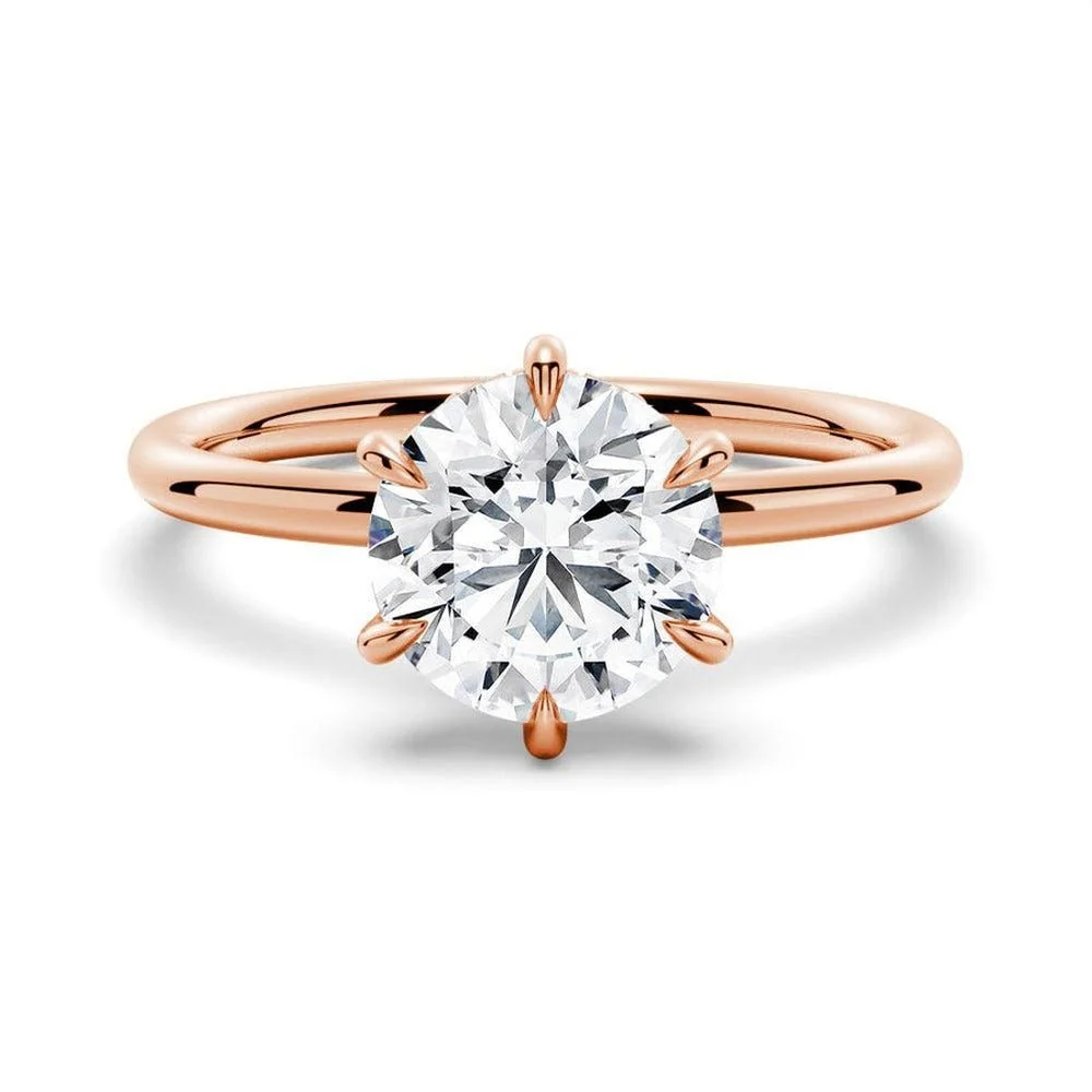Rose gold round cut moissanite six-prong solitaire engagement ring top view