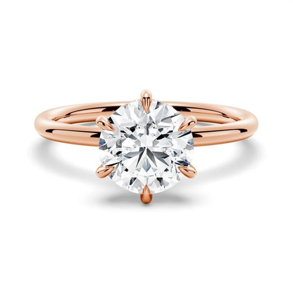 Rose gold round cut moissanite six-prong solitaire engagement ring top view