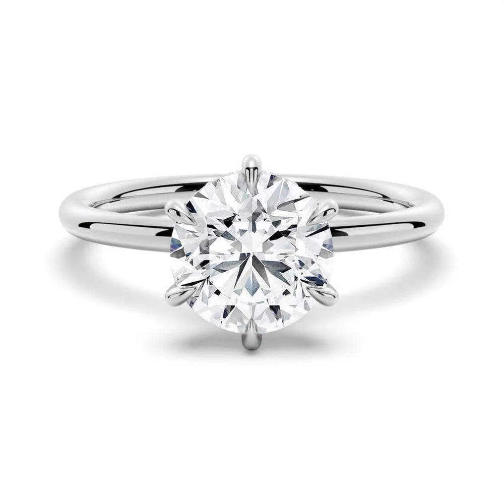 White gold round cut moissanite six-prong solitaire engagement ring top view