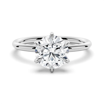 White gold round cut moissanite six-prong solitaire engagement ring top view