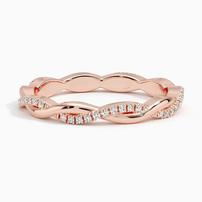 Front view of scalloped pave round moissanite twist wedding band in rose gold color