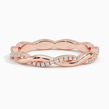 Front view of scalloped pave round moissanite twist wedding band in rose gold color