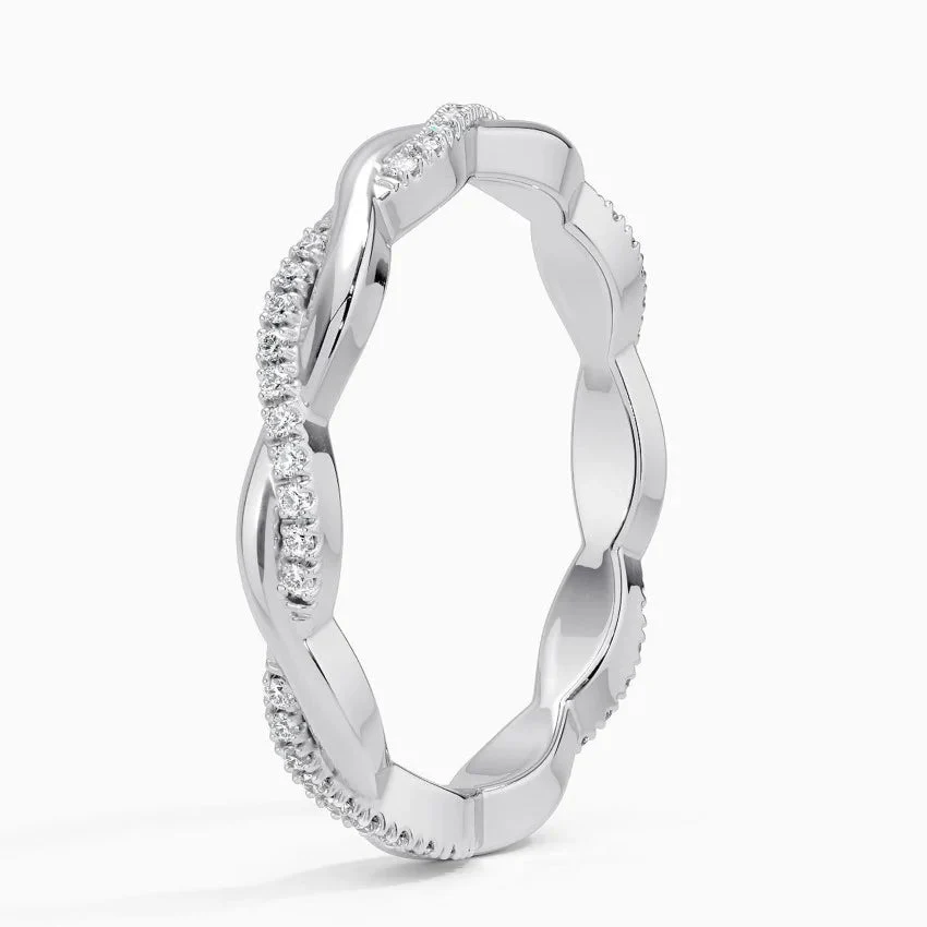 Vertical perspective view of 2.5mm scalloped pave moissanite twist ring in white gold color