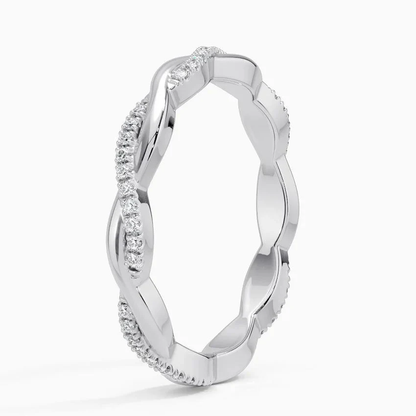 Vertical perspective view of 2.5mm scalloped pave moissanite twist ring in white gold color