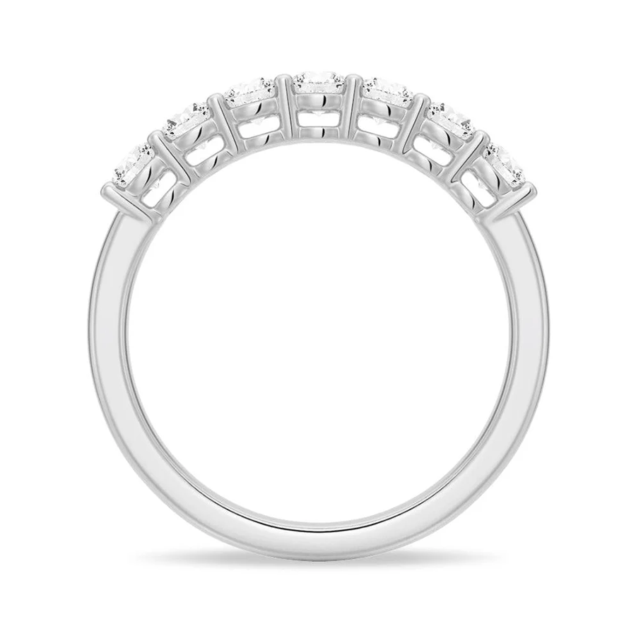 Profile view of 7 Stone Round Moissanite Wedding Band with Shared Prong Setting in White Gold 