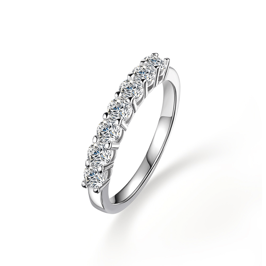 Angled profile view of 7 Stone Round Moissanite Wedding Band with Shared Prong Setting in White Gold