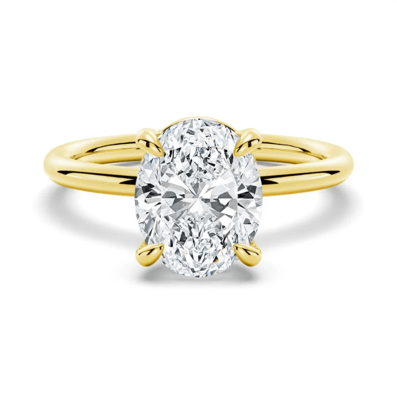 The Classic Oval Solitaire Moissanite Engagement Ring Timeless and Elegant style in Yellow Gold - Novelle Vow