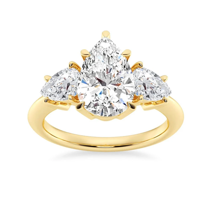 Yellow gold three stone pear moissanite engagement ring top view with plain band