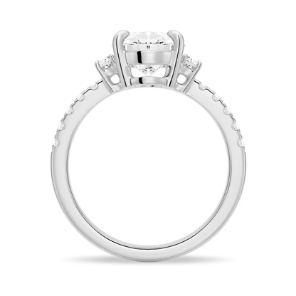 White gold three-stone oval moissanite engagement ring direct side profile setting