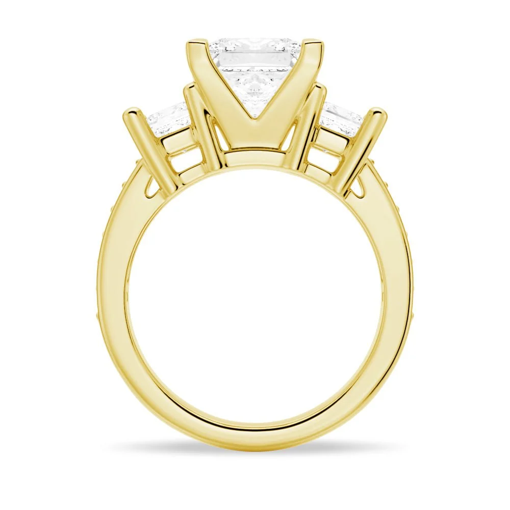 Yellow gold three-stone princess-cut moissanite engagement ring direct side profile view showing prong setting and pave shank