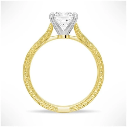 Yellow gold cushion cut moissanite engagement ring side profile view showing filigree scrollwork and white gold head