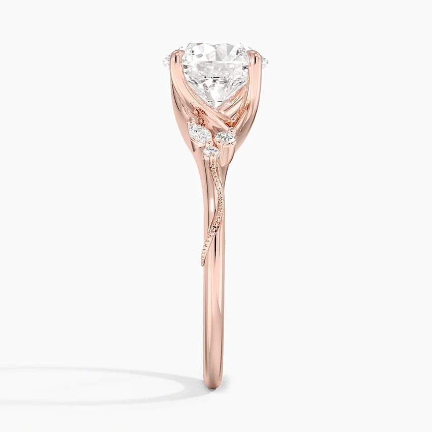 Side view of rose gold nature inspired moissanite engagement ring with botanical vine detail