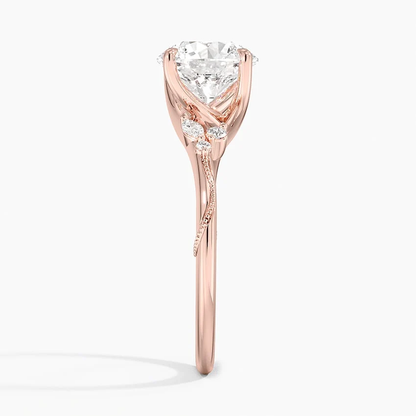 Side view of rose gold nature inspired moissanite engagement ring with botanical vine detail