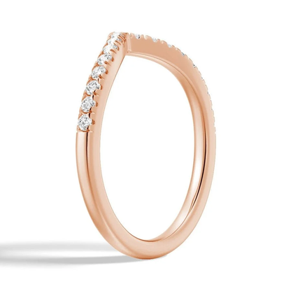 Three-quarter perspective view of women's 0.28ct TW curved V moissanite band in rose gold color